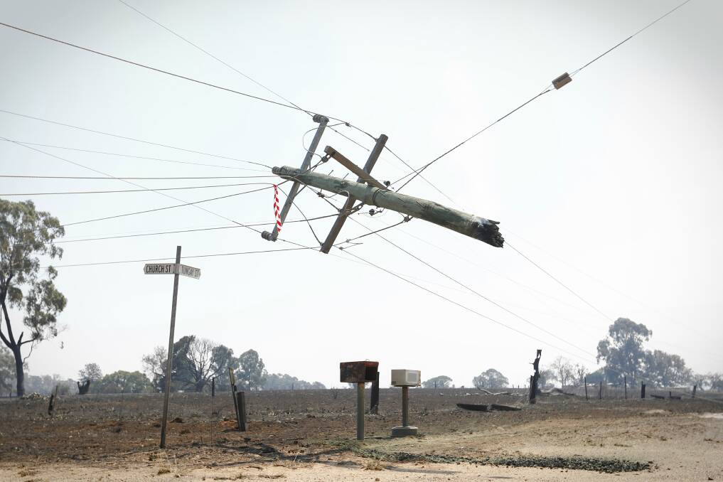 Powerlines at Uarbry, east of Leradville, after the village was razed by the Sir Ivan fire on Sunday.  Photo: ALEX ELLINGHAUSEN.