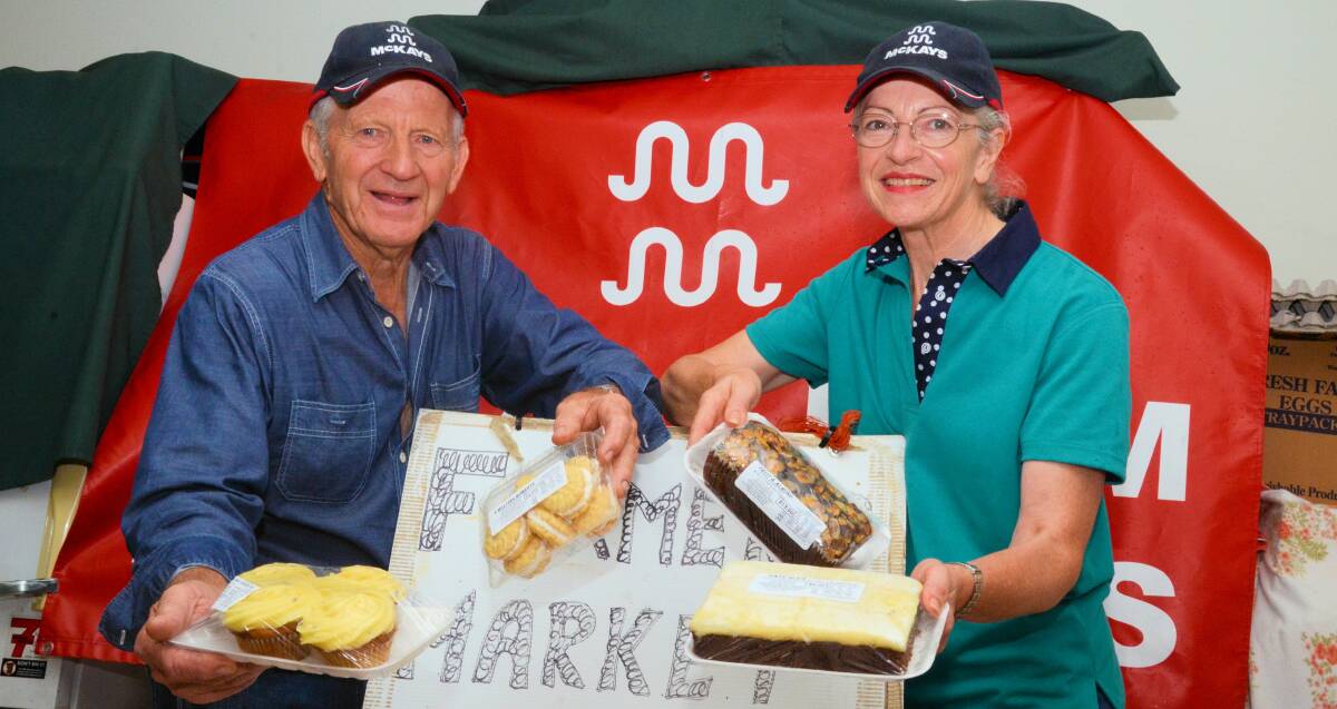 Alston and Geraldine McKay, Mullaley, display some of their home-baked cakes and biscuits they sell at the many Markets they attend.