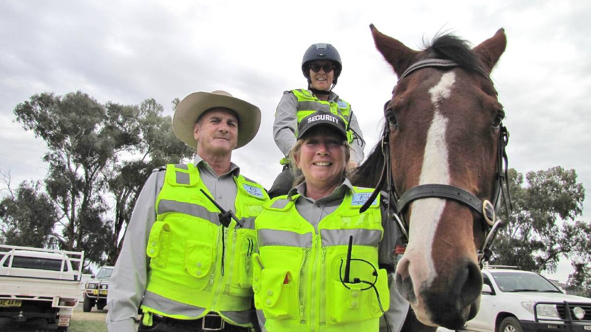 Phil and Deb Bell and Kylie Moore on "Barney" of the Mounted Security Services.