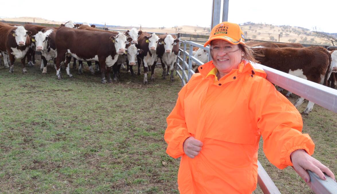 Kathy Carmody, Morpeth, of 1000KM for Kids Camp Quality cycle ride,  with stud cows. $2000 was donated.