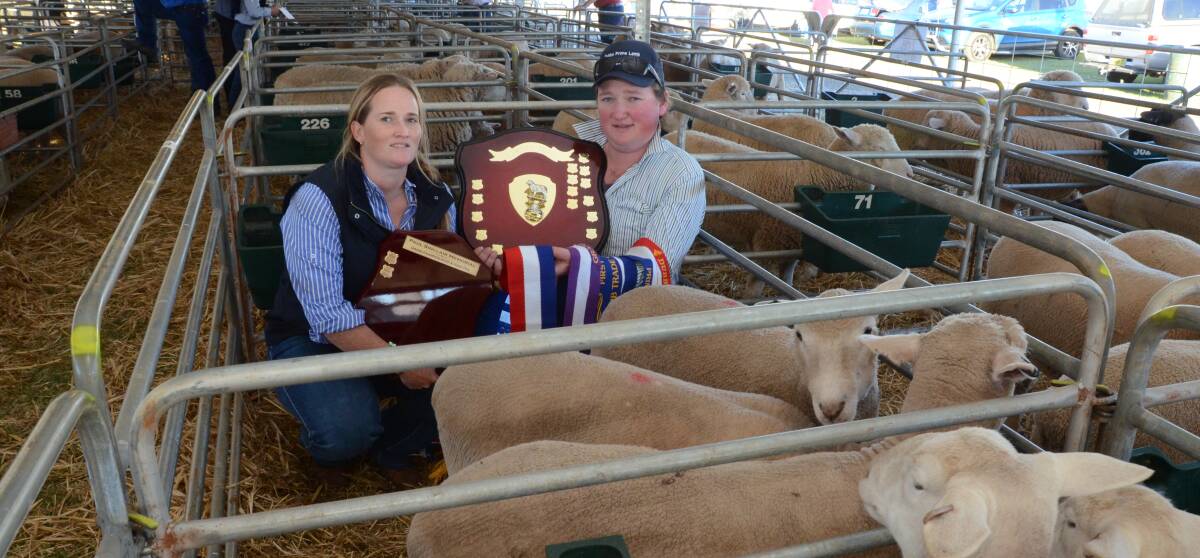Kate Mudford and Josh O'Connor, "Lynwood", Eumungerie, with their trophies and grand champion hoof and hook second-cross Poll Dorset lambs.