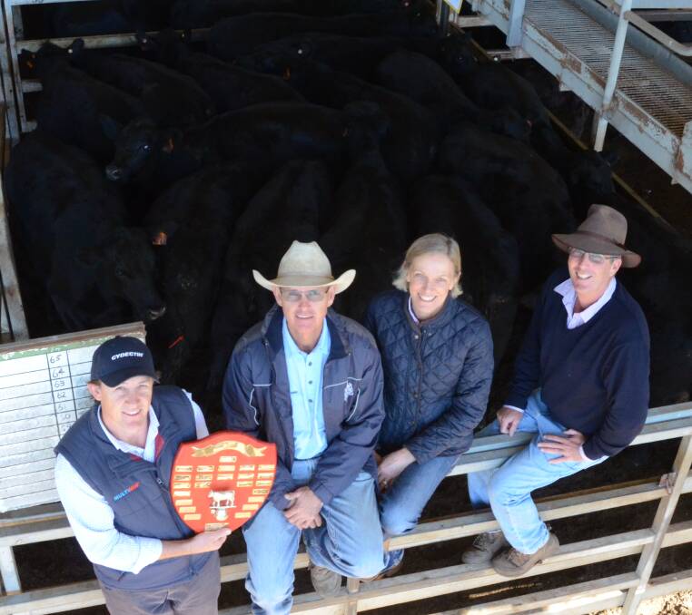 Second year in succession the Inglis family of "Havilah East", Mudgee, exhibit the champion pen of heifers. Pictured is Ben Kidd, Cydectin, Dubbo, Jamie and Sarah Inglis and buyer Ross Plasto, Plasto and Company, Wellington. The PTIC heifers of Coffin Creek blood are from Coffin Creek matrons and sold for $2180 a head.