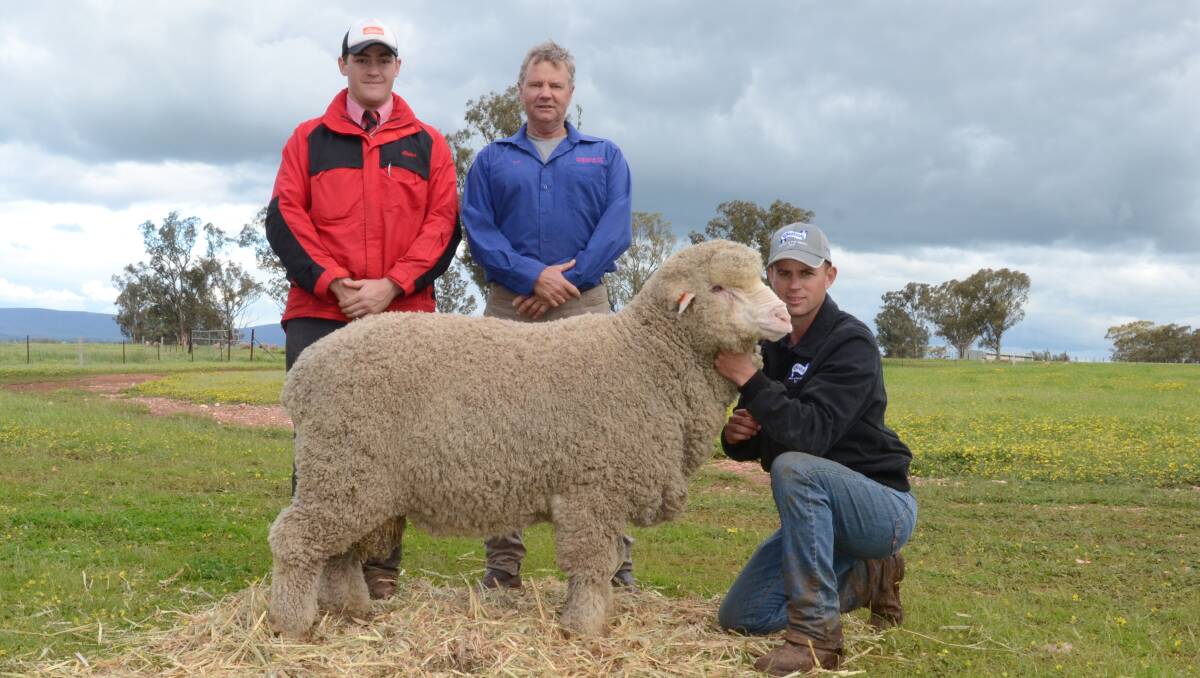 Will Chaffey, Elders Wool, Dubbo; Ray Cannon, the $6500 top-priced Poll Merino ram bought by Mark Taylor, Kojonup, WA, held by Blake Tremain-Cannon.