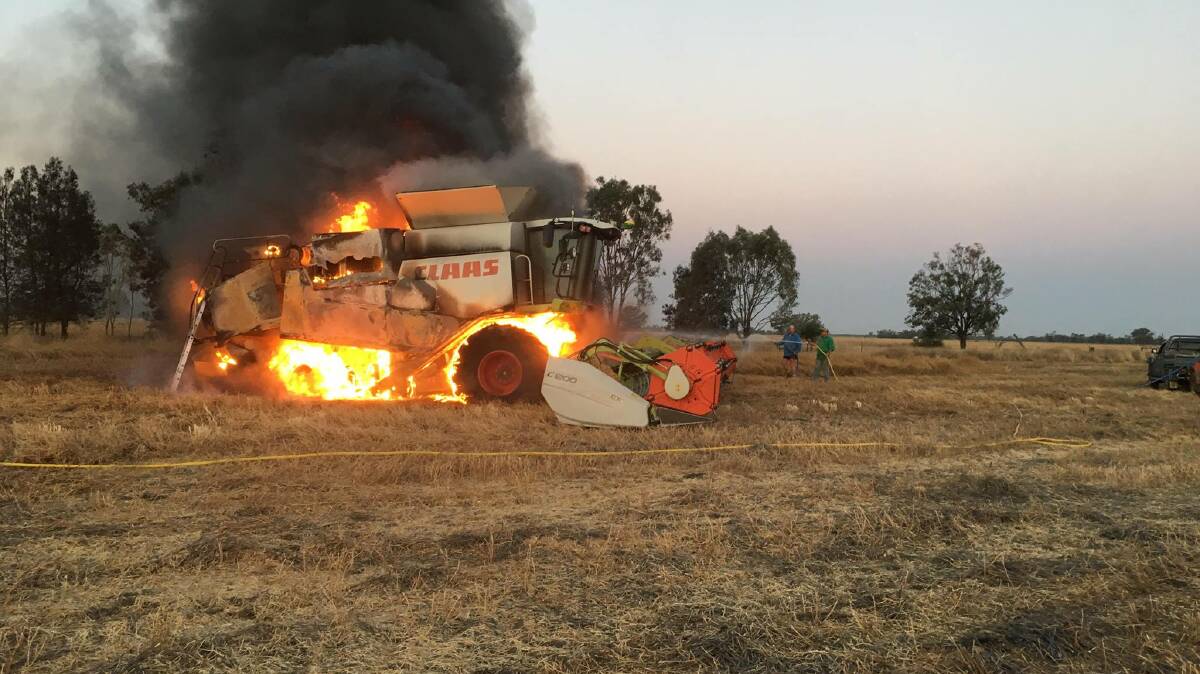 A Claas header which caught alight during harvest at Boomi NSW. 