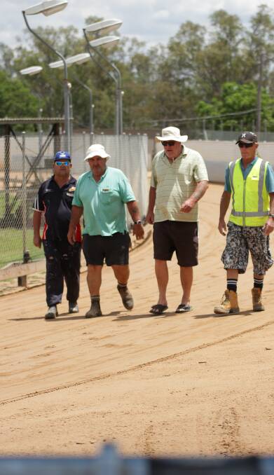 Inevitable end: Greyhound Breeders, Owners and Trainers Association chairman Geoff Rose (second from left) at the Gunnedah track on Tuesday. 
