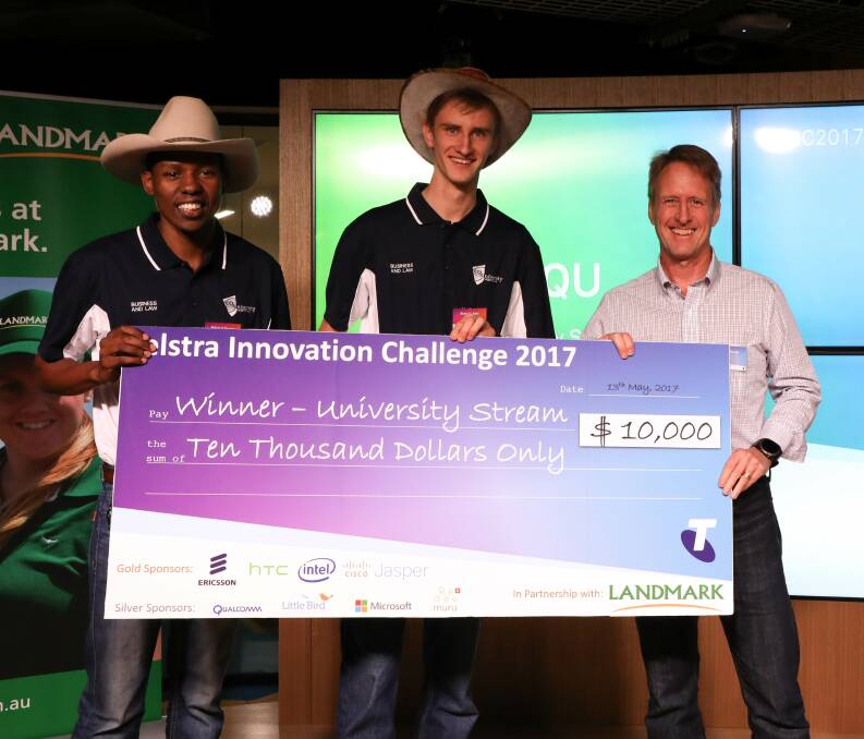 Agriculture student Polani Shadur (left) and Engineering (Mechatronics) student Branyon Apel teamed up to represent the CQUniversity School of Business and Law in the ‘University’ category of the Challenge. They are pictured receiving their prize from Telstra representative Alan Crouch.