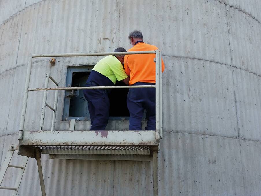 It is prudent to have a 'spotter' when you need to work in confined spaces. Photo by Bill Hanna.
