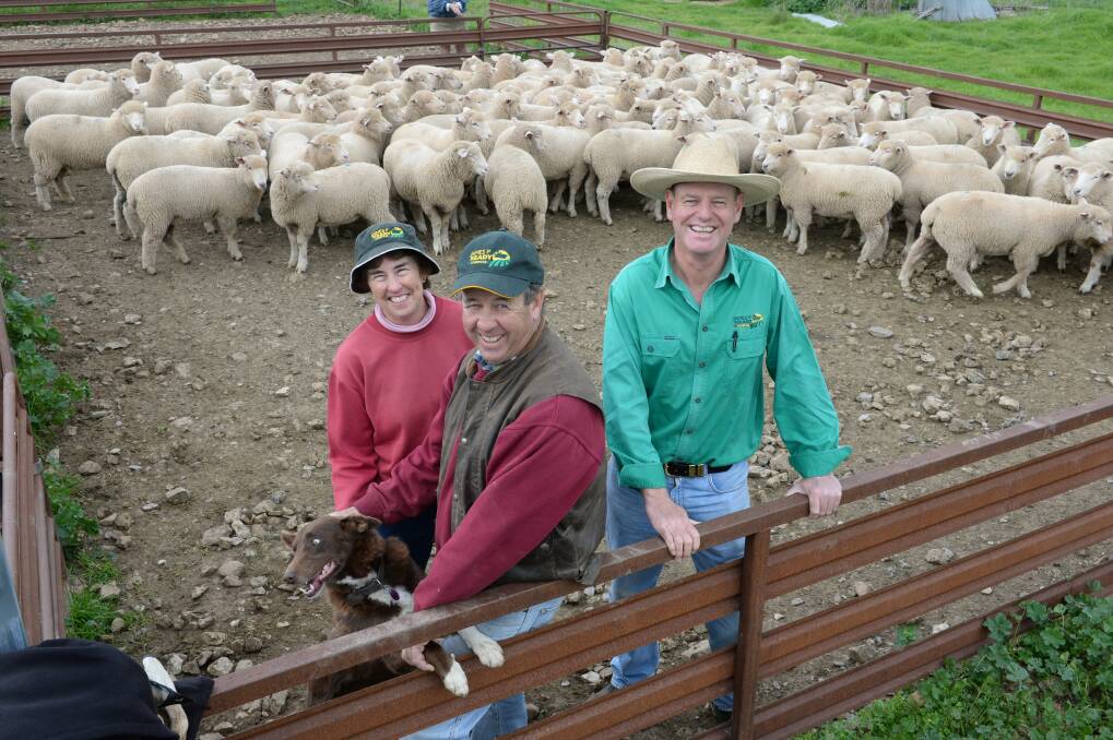 Julie and John Whitby, Cowra, with Cowra based Livestock Agent with James P. Keady say their second-cross lambs gives them the flexibilty to sell over the hooks or in the yards.