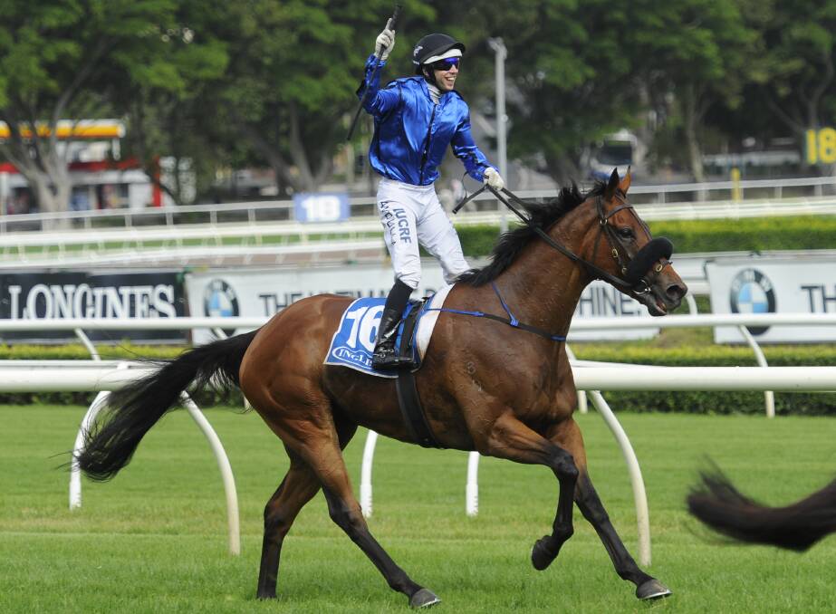 WINNER: A jubilant Brenton Avdulla salutes after winning the Villiers Stakes at Royal Randwick aboard Doncaster Mile aspirant, Happy Clapper. Picture: Bradley Photographers