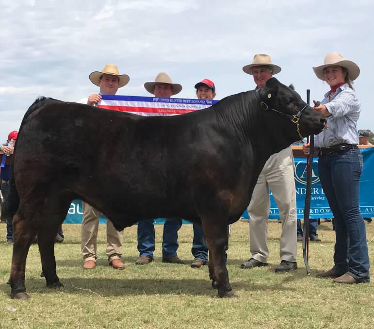 HEAVYWEIGHT WINNER: Judge, Ben Davies, Don Riley, Tamworth, owner of the sire, Kathy De Jong, Calrossy, and Robert Gill, Alexander Downs, with Calrossy's champion heavyweight led steer paraded by Megan Seis, Dunedoo.