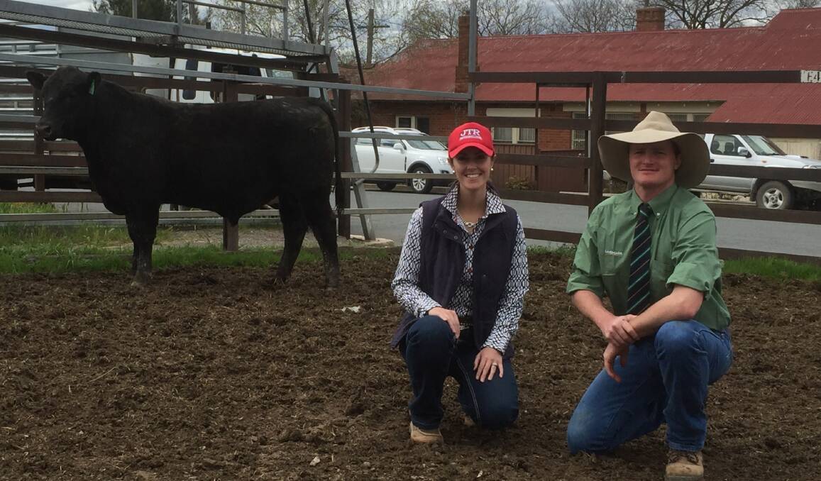 Jemma Reid, JTR Angus, Goulburn and Charlie Croker, Landmark Goulburn, with the top- price $7500 bull purchased by Melon Pastoral Company, Roslyn. The sale average lifted by over $400 from the previous year's result. 