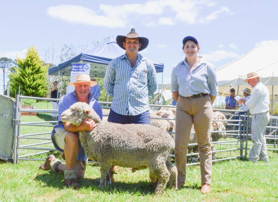 David Watson; Gavin Thorpe and Sophie Watson with the $2000 ram.