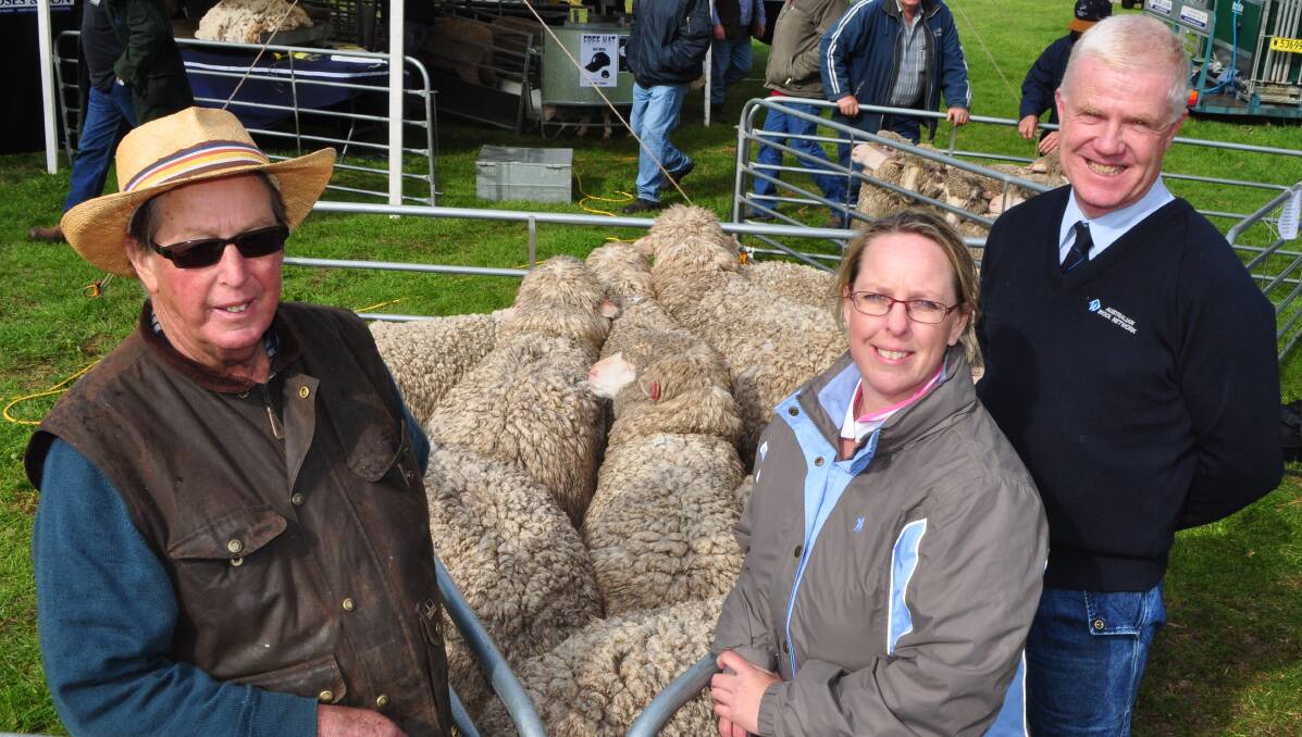 Father and daughter Eric and Yvette McKenzie, "Grasmere" Bethungra and judge Australian Wool Network NSW stud stock manager John Croake.