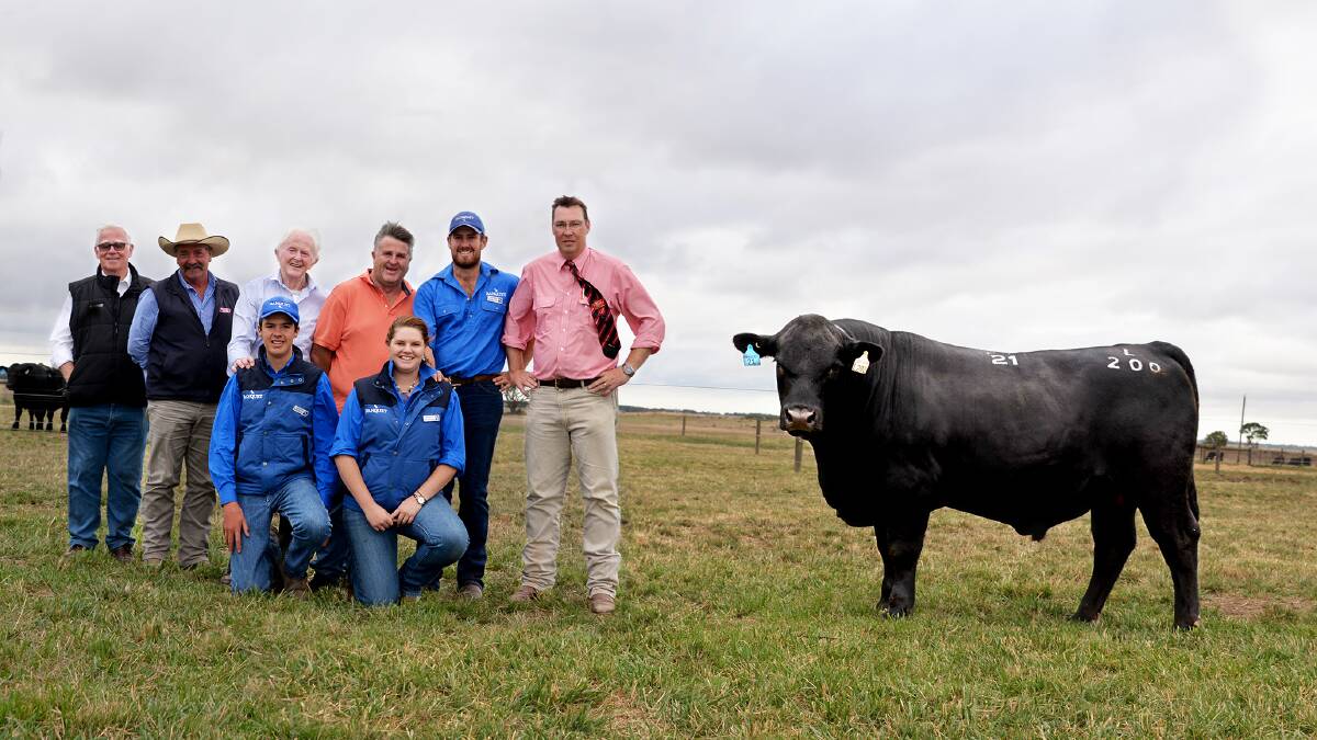 With the $52,000 bull are Kevin Norris, Rob Ould, Peter and John Blyth, Josh Meulendyks,  Ross Milne. Front  Hamish and Dianna Branson.

