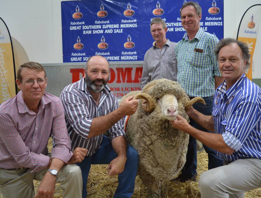 Successful syndicate members Malcolm Cox, Bocoble stud, Mudgee, Peter Lette, Conrayn, Berridale, Patrick and Andrew Davis, Demondrille, Harden and George Merriman, Merryville stud, Boorowa, with the $21,000 Merino ram. 