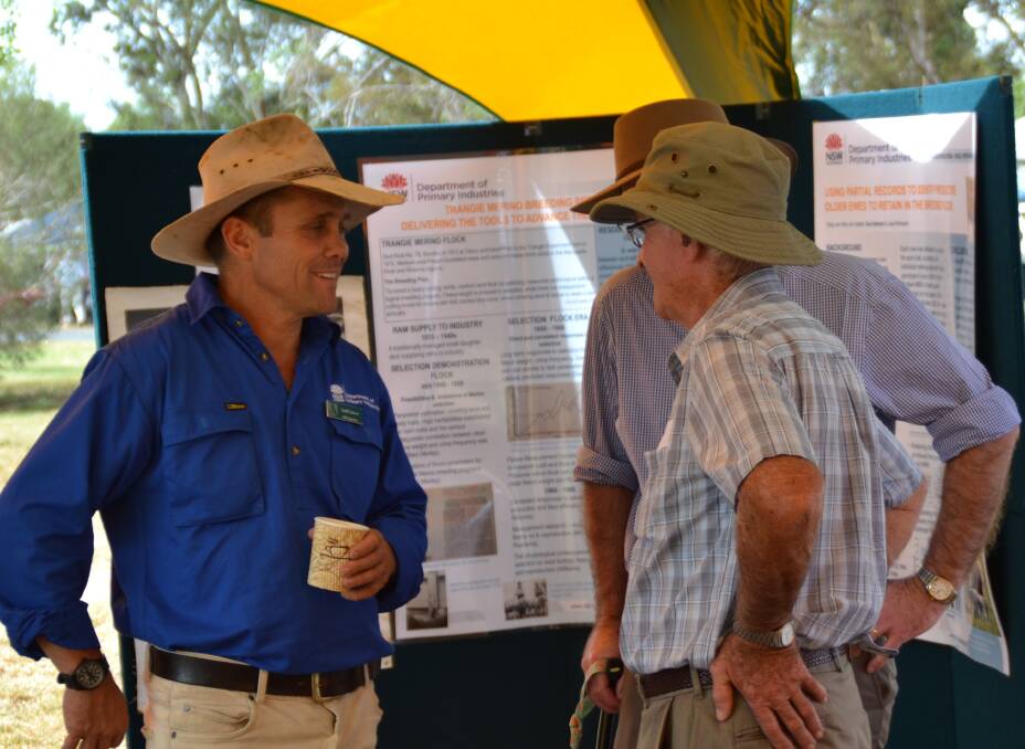 NSW DPI: Sheep development officer Geoff Casburn discusses sheep industry flux with producers. Photo: supplied.