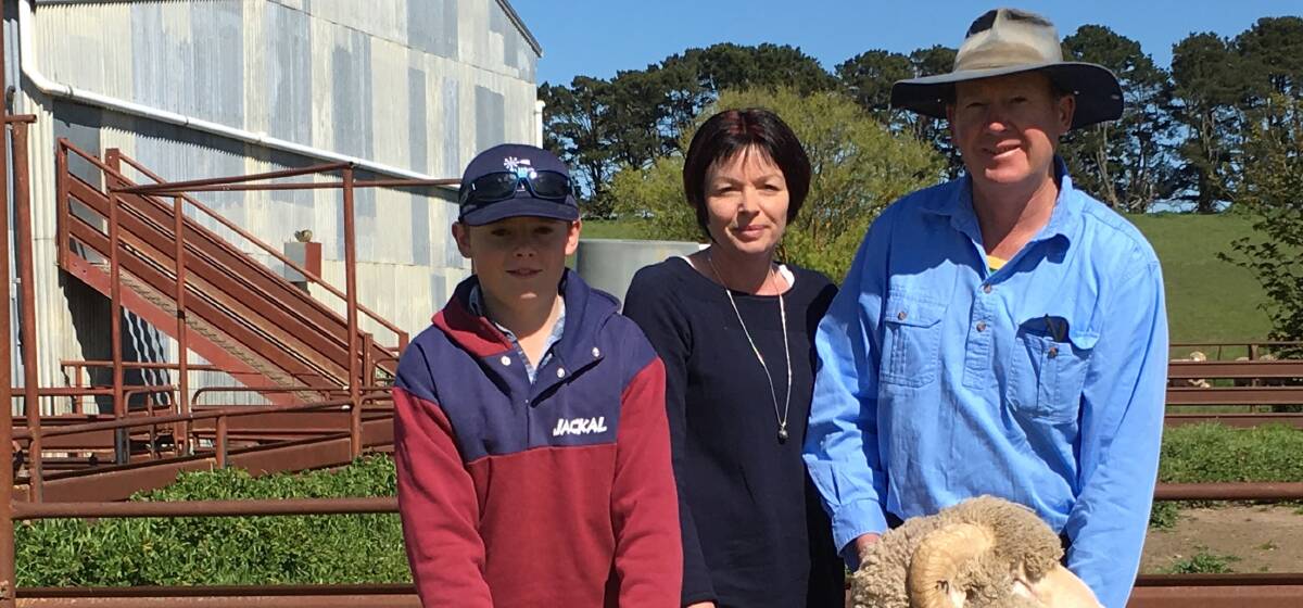 Daniel, Tracy and Andrew O'Brien, "Oakview", Biala, purchased the top-price $3200 ram at Carrabungla sale, Laggan. Photo supplied 