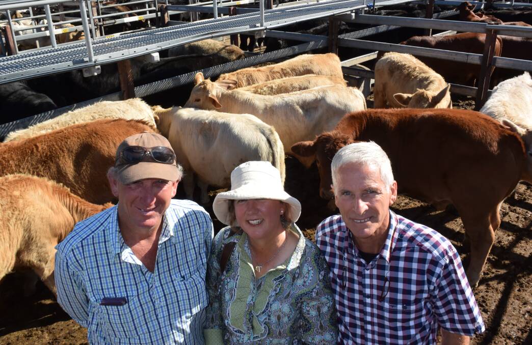 Ken Adams, right, helped produce this winning pen of EU weaner steers returning $969 with Greg and Jenny Frizell, ‘Wakefield’ Wollomombi who provided the bull.