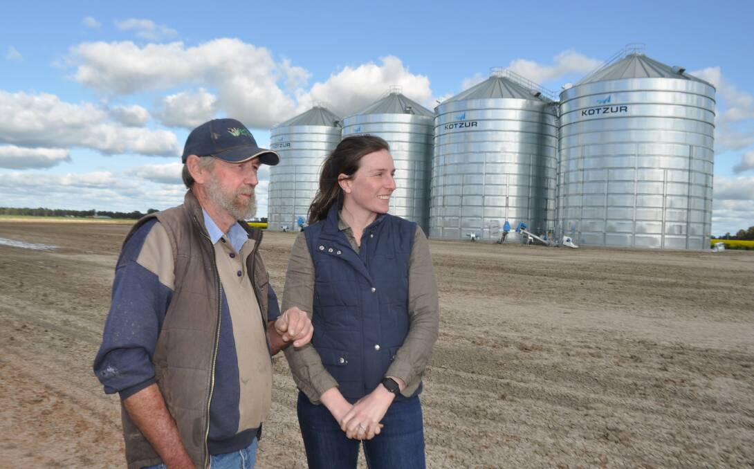 Bill Arnold and daughter-in-law Ella Arnold, Moora Park, Jerilderie. The Arnolds (pictured on our cover) have just put in four 1300 tonne silos to increase their options during this season's harvest. Photo: Olivia Calver