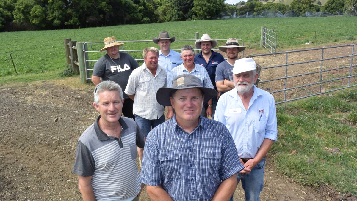 Woodlawn dairy farmer Andrew Wilson, front and centre, flanked by dairy consultant Phil Shannon, left and Norco field officer Bill Fulkerson, right, with a few of the members of the farm focus group in the background: Glen Lees, Ken Bryant, Charles Hope, Craig Waddell, Nathan Jennings and Dennis Rose.