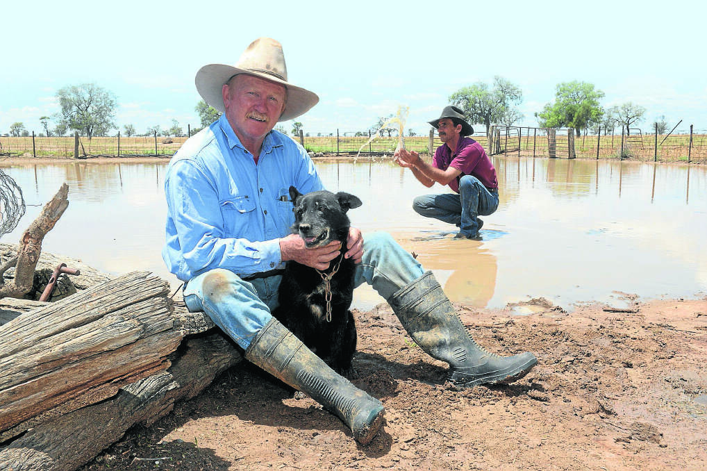 SWEET RELIEF: Bill Colless, "Eurabha", Come-By-Chance, and employee Shane Thurston with Kelpie Max.