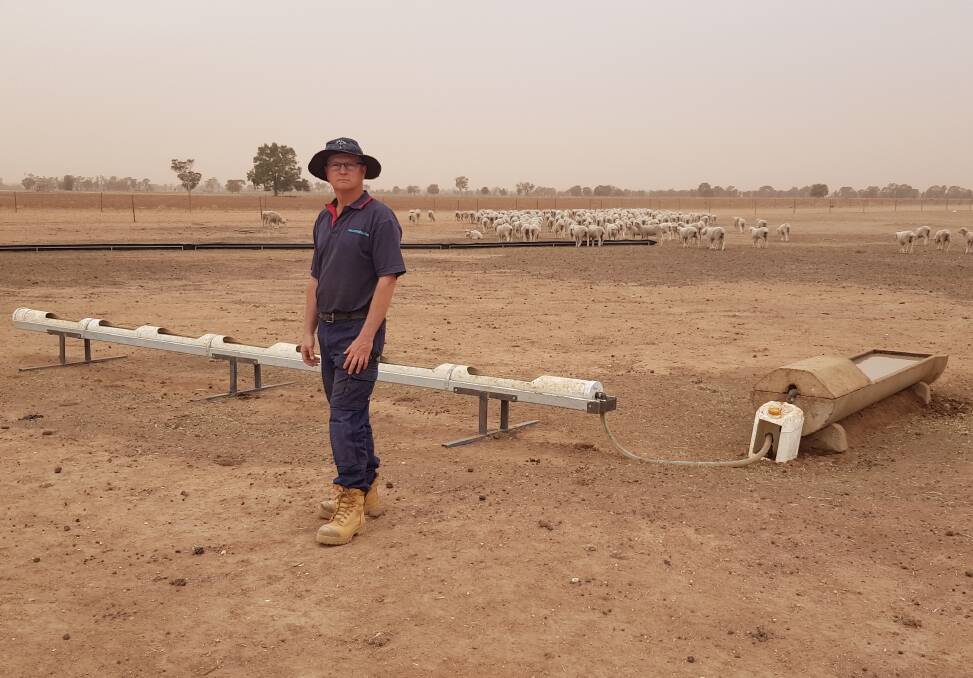 Mark Mortimer, Tullamore, has built troughs from PVC to try and reduce the amount of dust and manure getting in the sheep's water. Photo: Supplied