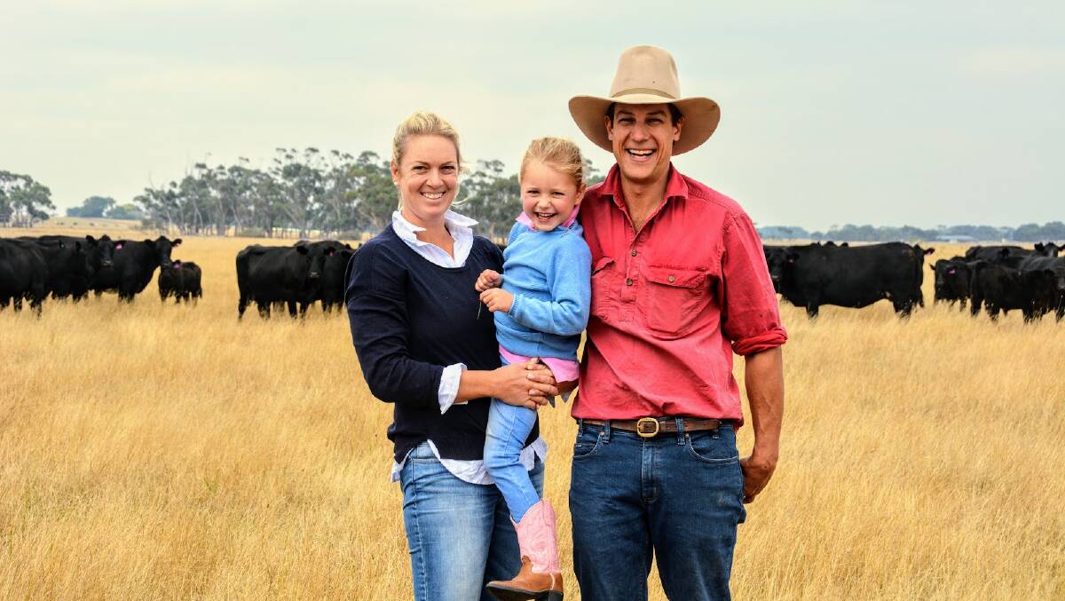 Georgie, Olivia and James Knight with their Angus cattle at Mortlake, Victoria. The Knight's won the Beef Spectacular this year, managing to continue producing quality cattle even with a large increase in their stocking rates. Photo by Georgie Selman. 