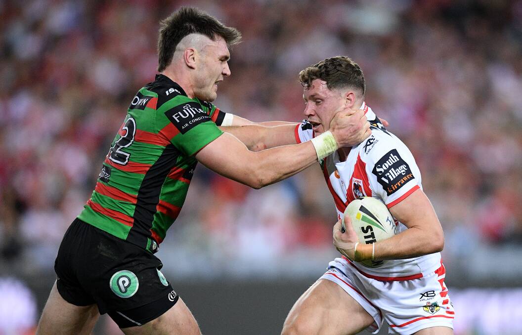 Angus Crichton takes on the Dragons last week sporting his interesting new haircut.