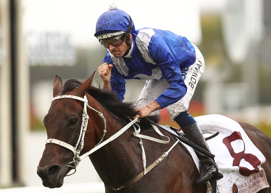 Dunedoo-born jockey Hugh Bowman celebrates after winning the George Ryder Stakes at Rosehill on Winx. Winx demolished a first-class field in trying heavy 10 conditions, taking her winning streak to 16.  