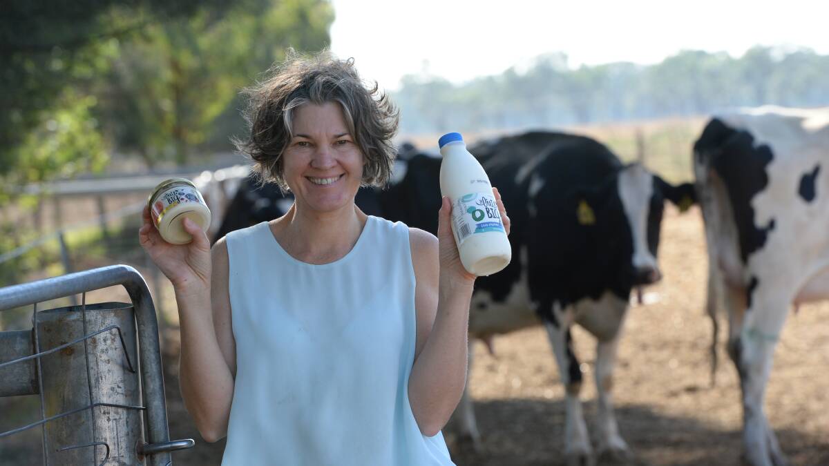 Winners are grinners - Erika Chesworth and her family from Rawsonville near Dubbo have won a national Grand Dairy Award defeating some of the biggest names in the dairy processing industry with their less cream milk. Photo by Rachael Webb 