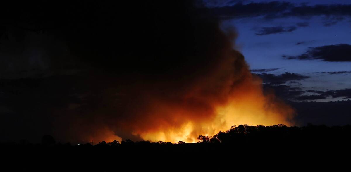 A fire burns near Cessnock on Wednesday. Photo by Darren Pateman/AAP.