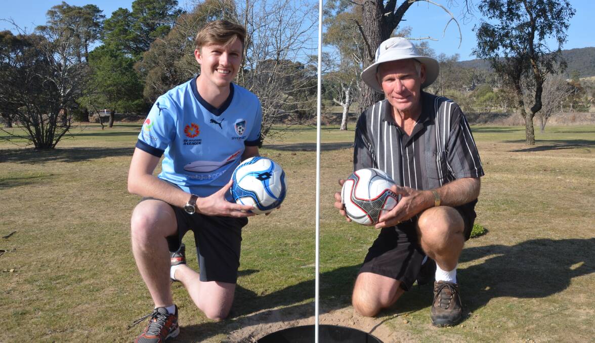 FUN IN THE SUN: Lithgow junior soccer coach Samuel Ogg and Lithgow Golf Club president Geoff Brooks are looking forward to seeing more people having a go at FootGolf. Picture: HOSEA LUY