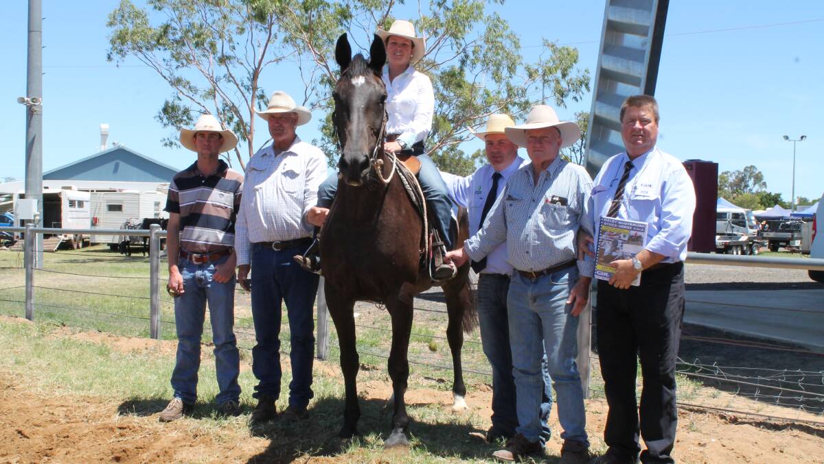 Joint buyers Ashley Harrison, Oakwood, Kilcoy, and Wayne Dennien, Koolara, Proston, with the $43,000 top-priced mare, Kirkbys Stud Dreams Charity, ridden by Claire Brown. Also pictured is local ASH Society branch president Jim Ryan, vendor Phillip Kirkby, Wave Hill, Narrabri, NSW and auctioneer Peter Brazier at the Dalby ASH sale on Sunday.