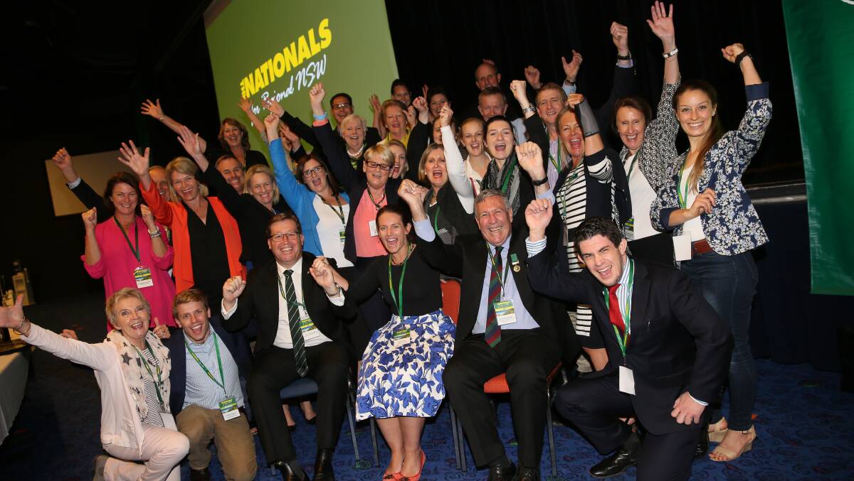 Nationals members celebrate the party's move to enshrine gender equity in local representation on its central committee. 