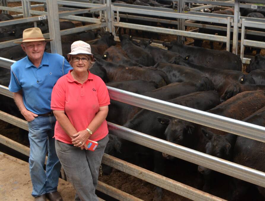 Graeme and Dawn Macaulay, “Teviot Dale”, Huon, Victoria, with the 25 8-10 month old Angus steers, weighing 362 kilograms, which sold for $1415 per head at Wodonga. The Macaulay’s sold 60 steers and 40 heifers in total. 