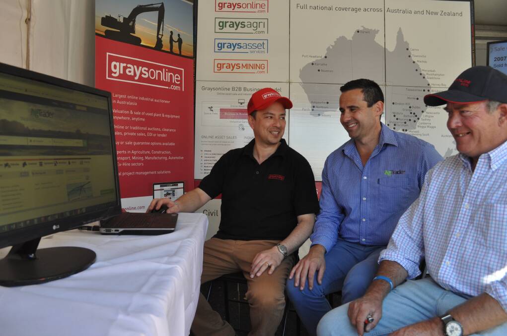 Graysonline.com's Antero Bonifacio and James Moore, and AgTrader's David Wallace (centre) are now in partnership to deliver auctions on agtrader.com.au.