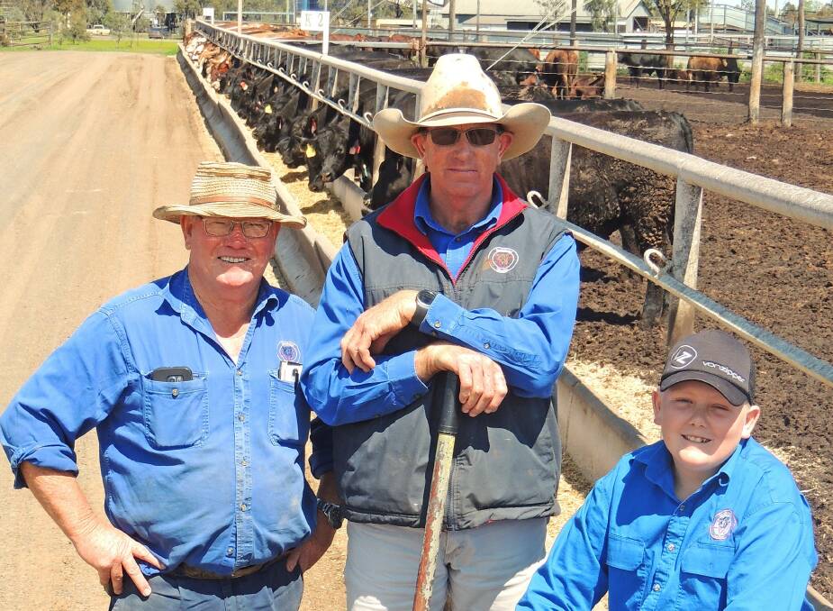 Three generations at Sandalwood Feedlot: Kev Roberts (left), with his son-in-law Warren Salter, also managing director at Sandalwood and Warren’s son (Kev’s grandson) Charlie, who works at the feedlot whenever he gets a chance.
