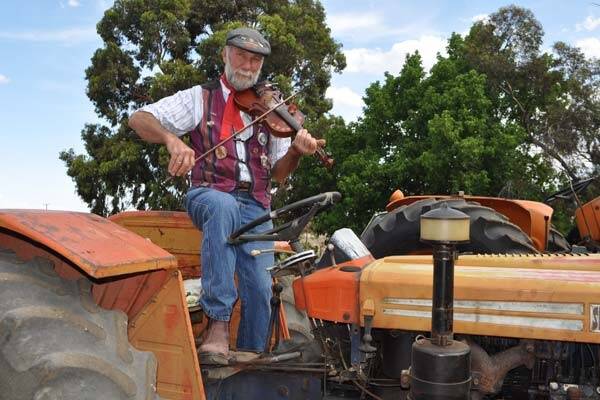 A man for all seasons: Coleambally prune farmer Roy Duffell can marry you, play the music at your wedding reception and at the end of your life, he can also put out fires on your property as captain of the local Rural Fire Service brigade.