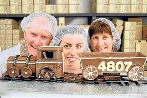 Junee Licorice and Chocolate Factory owner Neil Druce with Emma Turner and Vicki Murdoch.