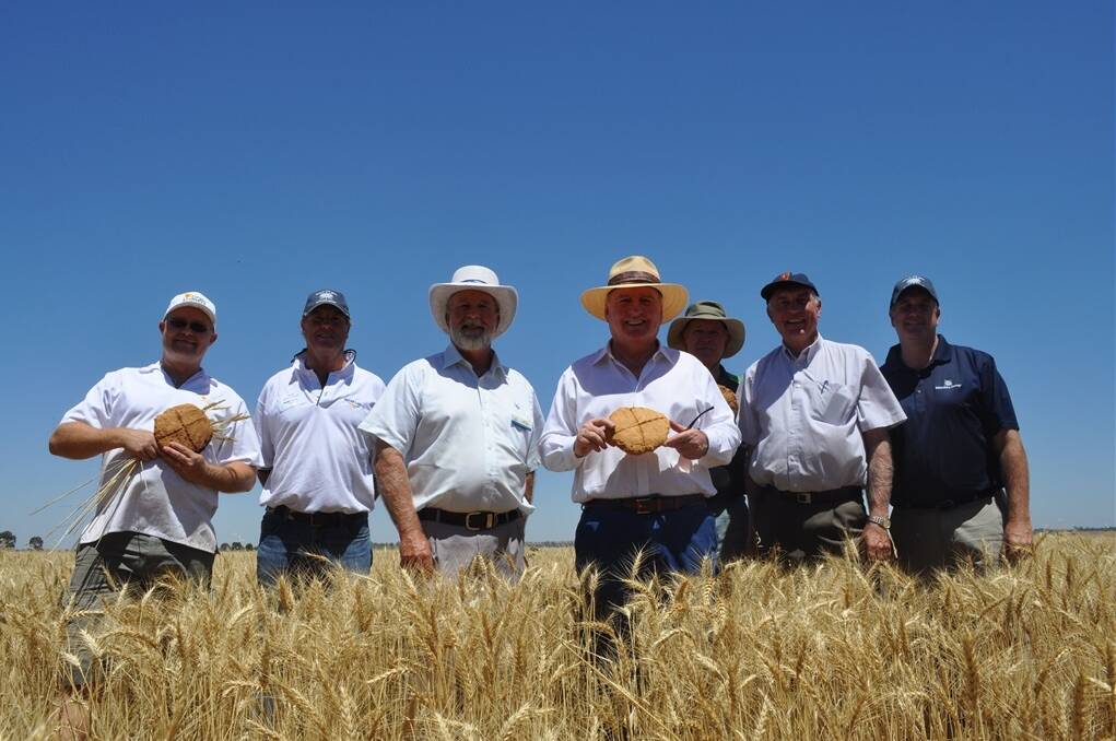  Baker Morten Staer, MSM Milling director Bob MacSmith, Parkes Mayor Councillor Ken Keith, radio broadcaster Alan Jones, farmer Neil Unger, Leader of the Nationals Warren Truss and Manildra Flour Mill manager John Brunner, at Neil Unger's property, "Wimmera", Parkes, where a standing crop of wheat was reduced to flour and turned into 13 loaves of bread in less than 17 minutes.