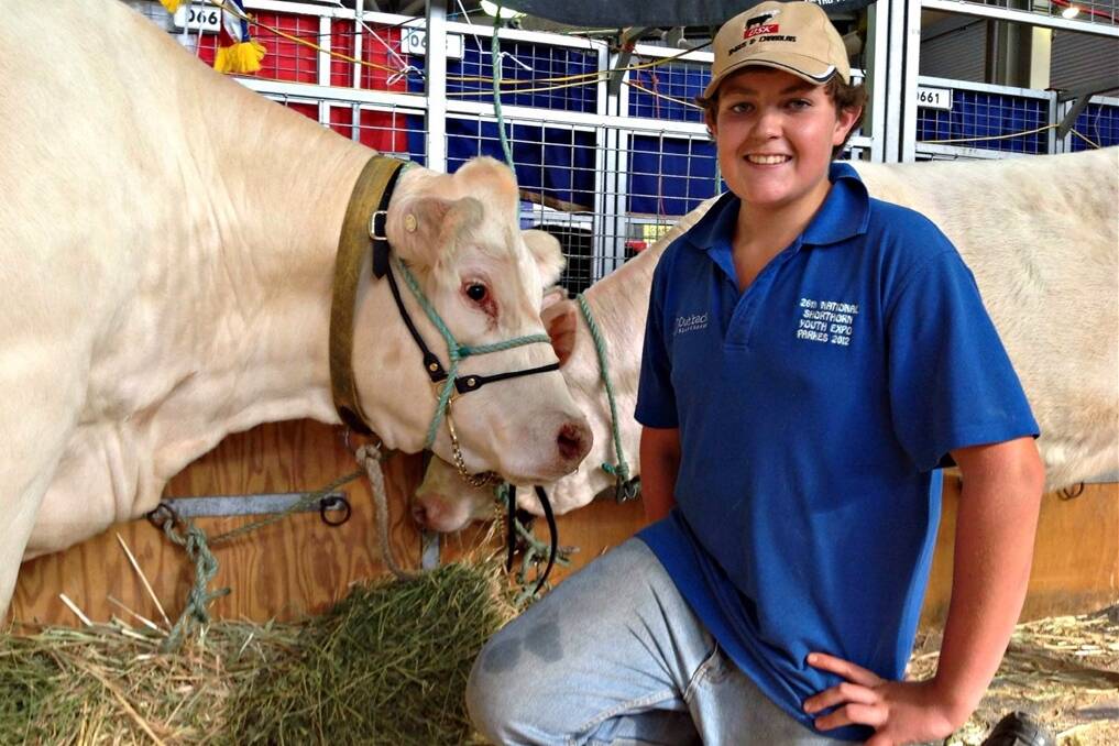 Will Fagan, 15, Canowindra, with DSK Charolais' grand champion female Venturon Gorgeous.