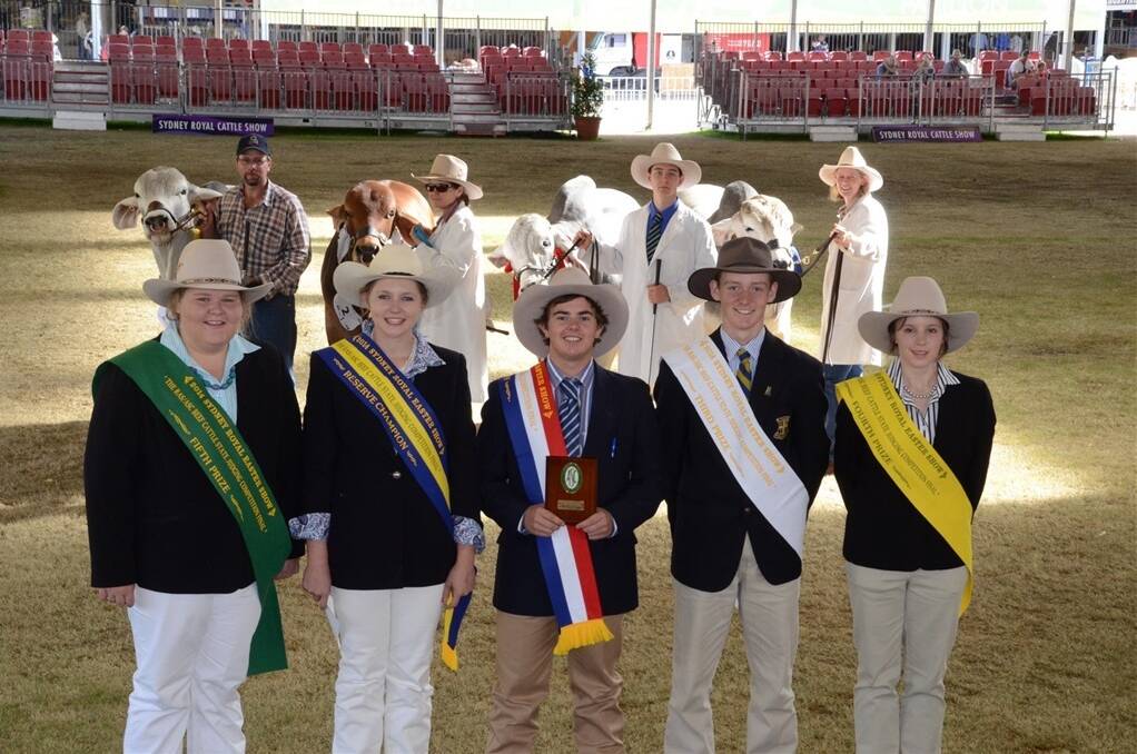 Jesse Joseph (centre) with placegetters in the NSW State Beef Cattle judging final at 2014 Sydney Royal Show.