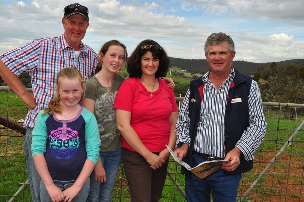 Vendor Gerald Spry (right), Sprys Shorhthorns, Wagga Wagga, with Phillip and Richele Loane, Dunroan Shorthorn stud, Devonport, Tasmania, and their daughters Caitlyn, 12, and Emily, 10. The Loane family bought the top priced bull Sprys Double Barrel for $28,000.