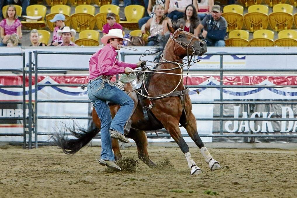 Heath Nichols in action on his horse, Iceman, on the way to a steer wrestling title in the first round of the National Finals. Photo: Frenchs Rodeo Photos.