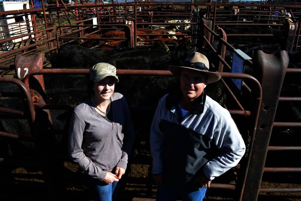 LEFT:John and Brooke West, “Westview”, Mulloon, sold 11 Angus steers, eight months old, weighing 291kg, to 210c/kg to return $611.