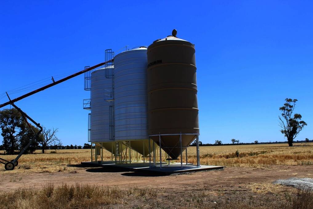 Poly Silo in front of more traditional grain storage systems.