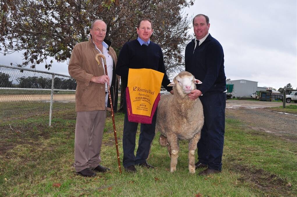 Mark Bazeley, Riverina Wool, Moama; FS Falkiner's Justin Campbell and  Angus Munro, Conargo, with the winning hogget ram of the Hay Merino Sheep Show. 