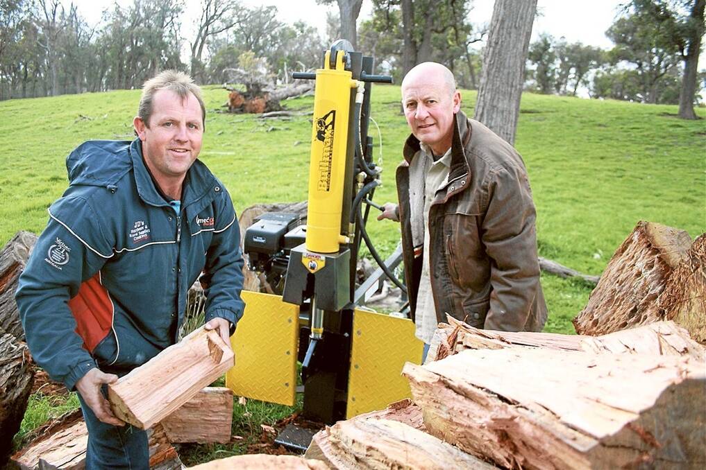  Bullmax chief executive Stephen Clark and JD's Hardware and Rural Supplies representative Jason Della, Laggan, with the Bullmax log splitter the pair developed for Australian conditions.