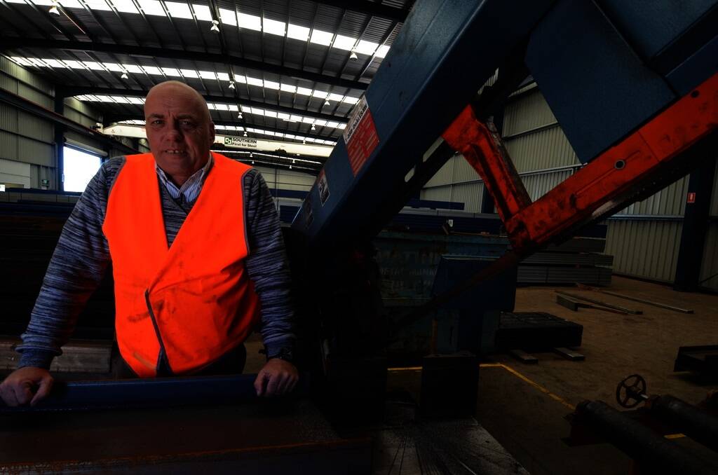 Paul Pedersen at the steel cutter in the Southern Steel Pty Ltd?s fabrication shed, Dubbo.