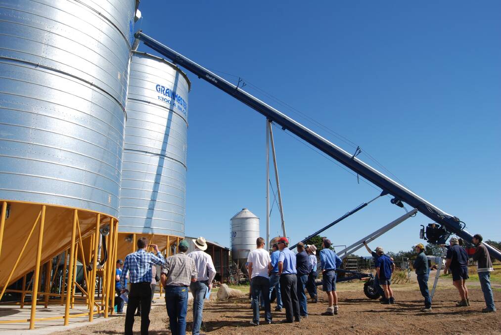 Grain growers from the Northern Rivers watch demonstrations of silo pressure testing at a Casino farm.